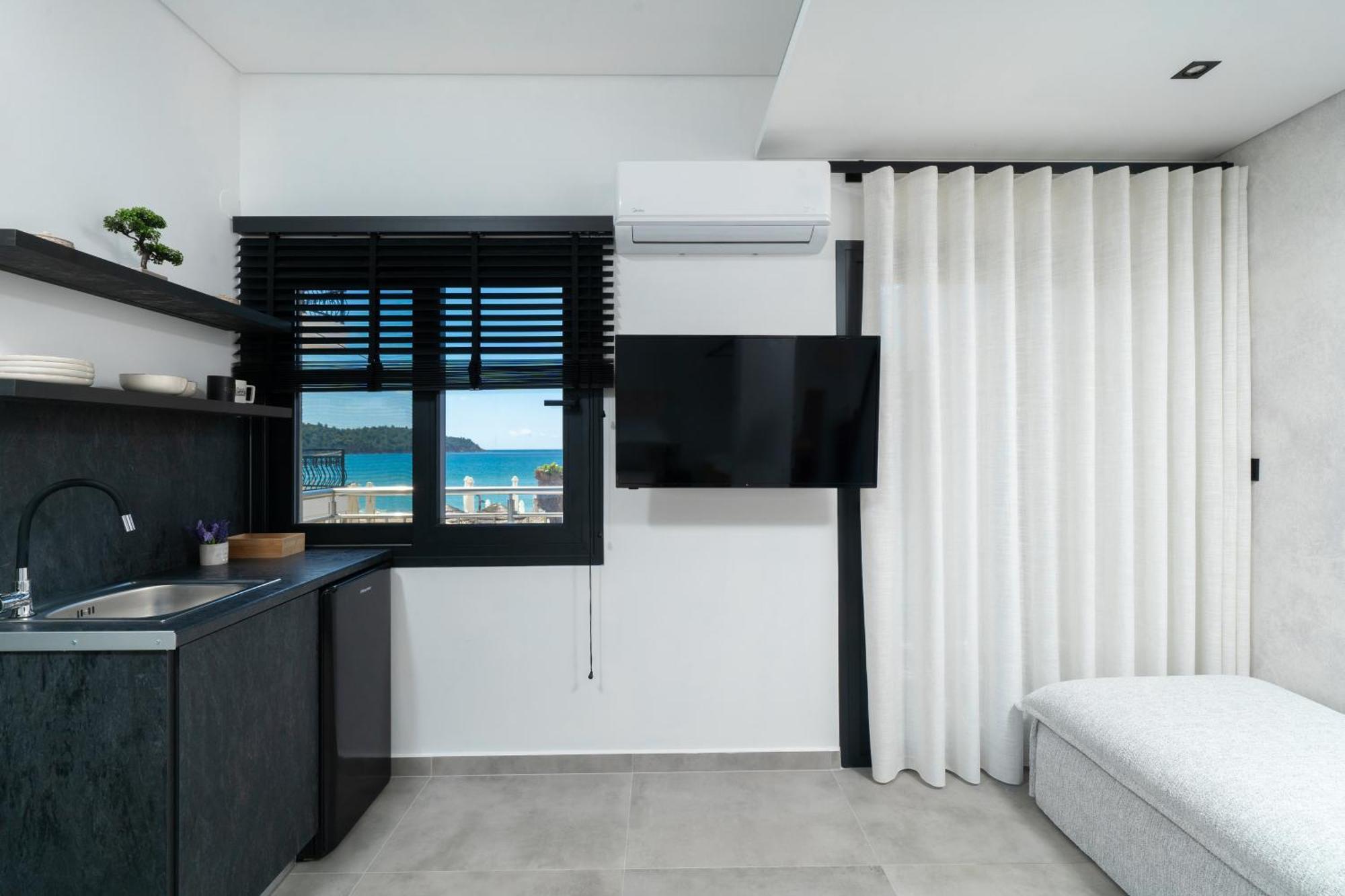 Parilion Suites Потос Екстериор снимка